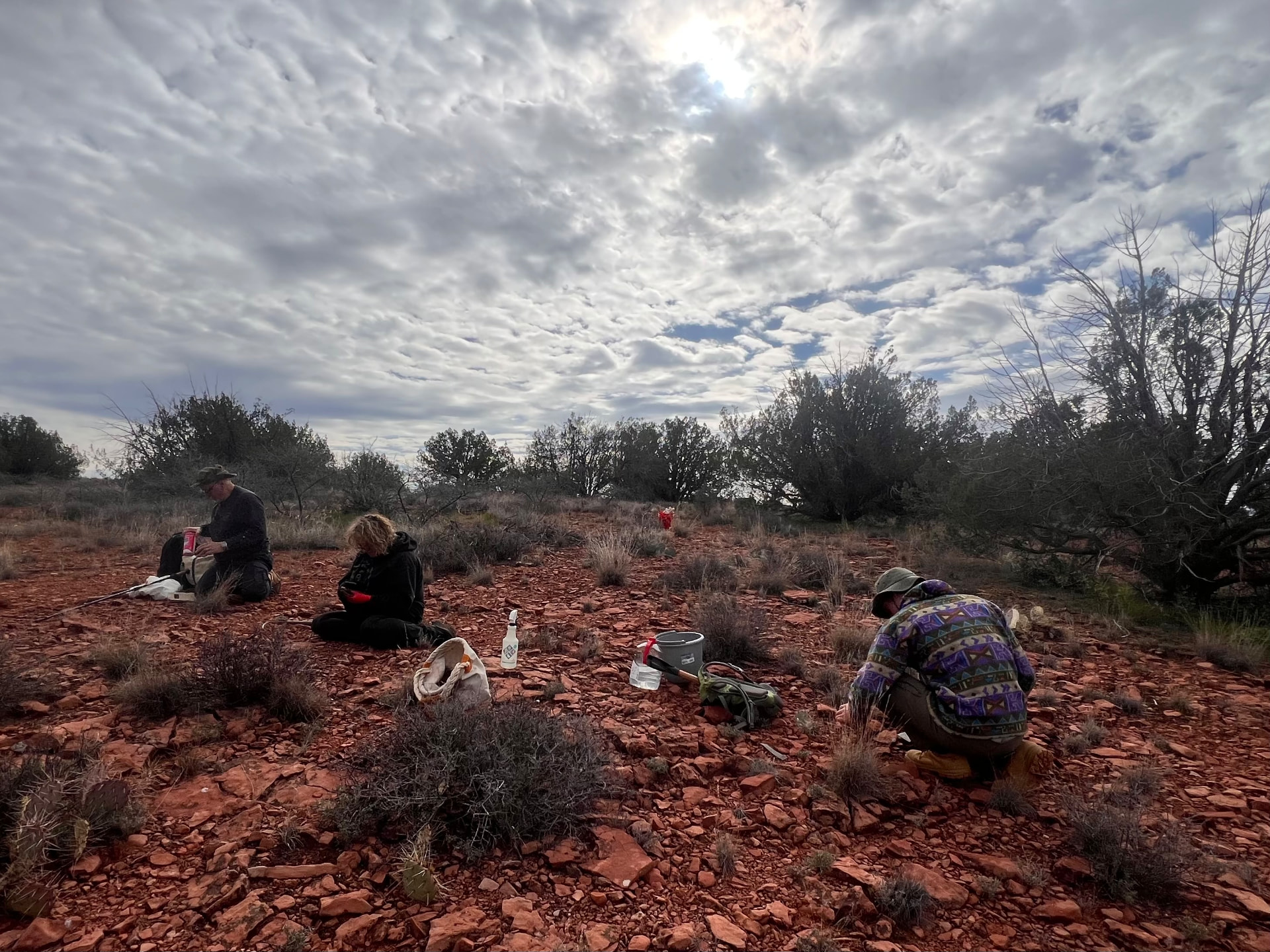 Prospectors digging in the red Sedona dirt on the Kinney Mining Co. claim